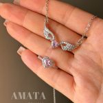 ست گردنبند و انگشتر و دستبند جواهری بال فرشته صورتی