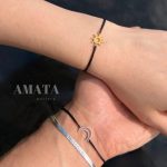 دستبند کاپلی ماه و خورشید بند مشکی
(ماه نقره ای خورشید طلایی)